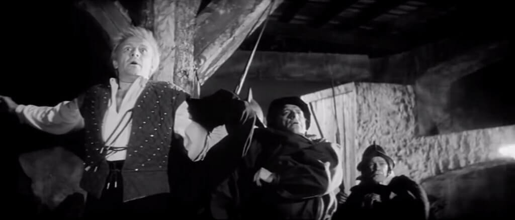 Horatio and Hamlet has spotted the ghost in Kozintsev's dramatic adaption of the scene in his film from 1964.